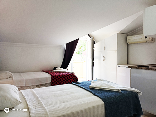 Family room for 3 people with 2 double beds